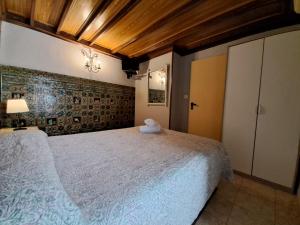 Ein Bett oder Betten in einem Zimmer der Unterkunft Pensión Riosol