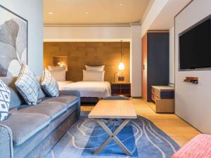 Ein Bett oder Betten in einem Zimmer der Unterkunft Swissotel Nankai Osaka