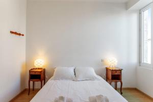Ένα ή περισσότερα κρεβάτια σε δωμάτιο στο Appartement Citadelle - Welkeys +4 φωτογραφίες