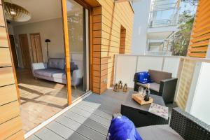 Zdjęcie z galerii obiektu Słońce & Plaża Apartamenty Krynica Morska w Nautikka Park w mieście Krynica Morska