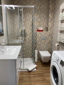 Kúpeľňa v ubytovaní Apartamenty Leśna 1 + 37 fotografií