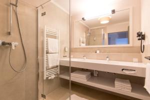 Vannituba majutusasutuses Familienhotel Felsenhof