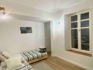 A bed or beds in a room at Apartamento Puerta del Camino 4