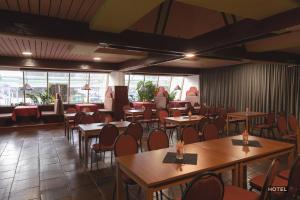 مطعم أو مكان آخر لتناول الطعام في MC Hotel