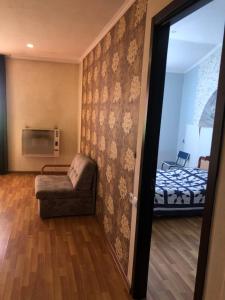 Postel nebo postele na pokoji v ubytování Apartment Zaziashvili 30