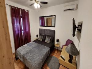 Postel nebo postele na pokoji v ubytování Rooms Argo