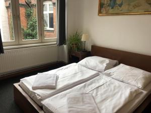 Postel nebo postele na pokoji v ubytování Die Fabrik - Hostel