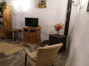 Telewizja i/lub zestaw kina domowego w obiekcie La Molina Del Olivar - Peaceful Location