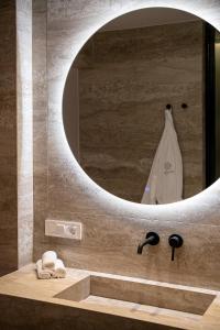 Koupelna v ubytování Riviera Suites