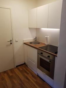 A kitchen or kitchenette at Exklusiv Apartment Sonnenalp