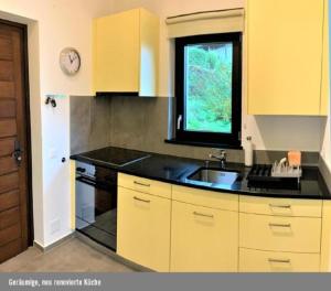 Kuchyň nebo kuchyňský kout v ubytování Residenza Viramonte - Casa Daniela, Wohnung 38