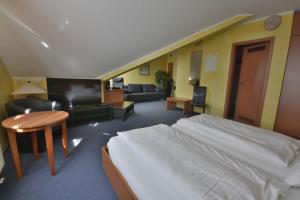 Postel nebo postele na pokoji v ubytování Hotel Nord
