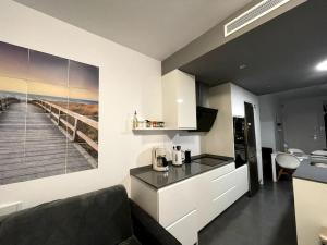 Η κουζίνα ή μικρή κουζίνα στο Modern Apartment with pool area