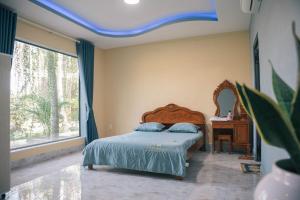Postel nebo postele na pokoji v ubytování Homestay Bảo Bình