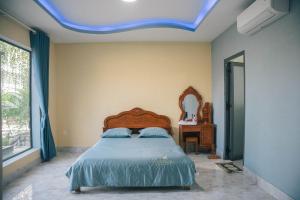 Postel nebo postele na pokoji v ubytování Homestay Bảo Bình