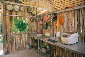 Kuchyň nebo kuchyňský kout v ubytování Homestay Bảo Bình