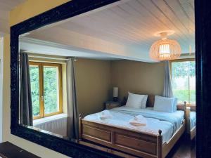 Posteľ alebo postele v izbe v ubytovaní Magnifique maison avec piscine au calme du Gers + 37 fotografií
