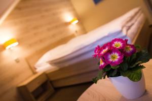 Postel nebo postele na pokoji v ubytování Hotel Freud