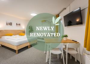 Postel nebo postele na pokoji v ubytování Self-service Hotel Ostaš Praha