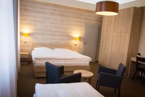Postel nebo postele na pokoji v ubytování Hotel Freud + 37 fotografií