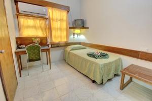 Honiara Hotel客房内的一张或多张床位