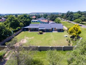 an aerial view of a house with a large yard at NN Jacaranda Guesthouse in Newcastle