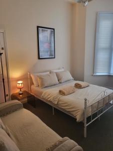 Postel nebo postele na pokoji v ubytování Ivona small apartment