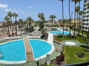a view of a pool with a resort at Apartment PM237 - Paraiso Maspalomas in Playa del Ingles