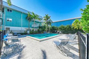 Πισίνα στο ή κοντά στο Anna Maria Island Beach Palms 5B