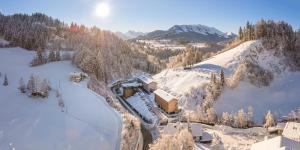 an aerial view of a ski lodge in the snow at Oberstdorf Hostel in Oberstdorf