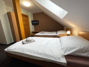 Rúm í herbergi á Hotel Aldo