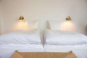 Letto o letti in una camera di Hotel Aahøj