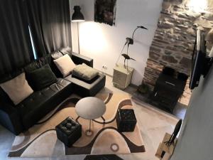 Posezení v ubytování Le Héron ( Gîte )