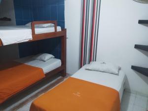 Poschodová posteľ alebo postele v izbe v ubytovaní Hotel Astor Plaza