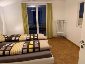 Postel nebo postele na pokoji v ubytování Wychelrain 6 Bett Wohnung
