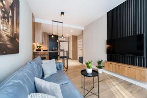 Kuchyňa alebo kuchynka v ubytovaní Krakowiak Apartment
