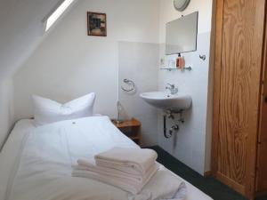 Postel nebo postele na pokoji v ubytování Guesthouse Beckmann