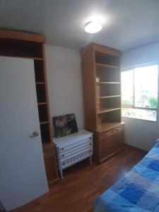 Postel nebo postele na pokoji v ubytování Plaza PUERTA NUEVA