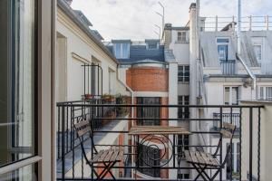 Balkón alebo terasa v ubytovaní Courcelles Design Duplex + 8 fotografií