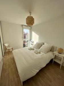 Posteľ alebo postele v izbe v ubytovaní Modern and bright apartment near Paris