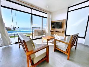 TV/trung tâm giải trí tại VISTA LINDA BUNGALOW para 10 personas Punta Veleros