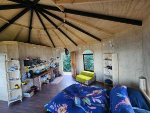 a large room with a couch in a house at HOSTAL TORRE DEL ESPAÑOL in Valdivia