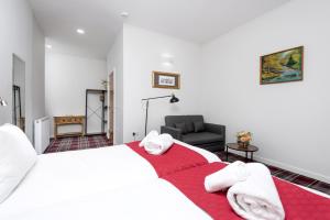 Letto o letti in una camera di SMITH PLACE HOTEL