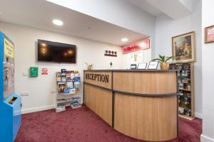 TV o dispositivi per l'intrattenimento presso SMITH PLACE HOTEL