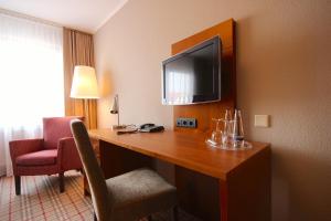 TV a/nebo společenská místnost v ubytování Hotel Hanken GmbH, Hotel Hanken und Seehotel