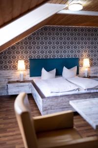 Postel nebo postele na pokoji v ubytování Hotel Harlesiel
