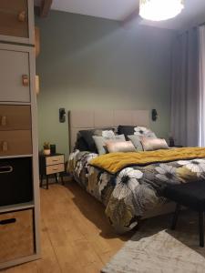 Posteľ alebo postele v izbe v ubytovaní le J&J Appartement spacieux climatisé en centre ville