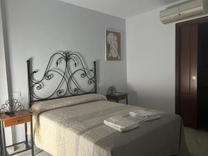 Voodi või voodid majutusasutuse Hostal Almanzor toas