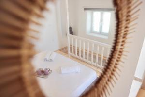 Postel nebo postele na pokoji v ubytování Whitelist Maisonette I and II in Mykonos Town