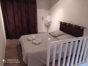 Posteľ alebo postele v izbe v ubytovaní Duplex avec jardin, proche village
